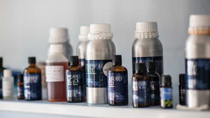 essential oils on a shelf to be used in Oleo Bodycare natural skincare products