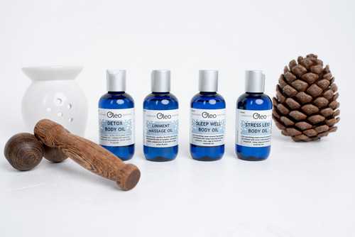 pine cone next to Oleo natural beauty range pine cone next to Oleo natural beauty range