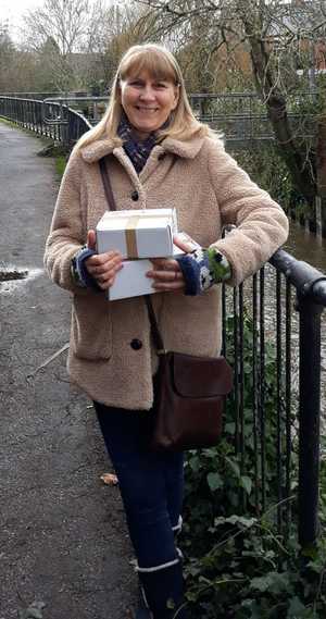 Olivia holding Oleo packages