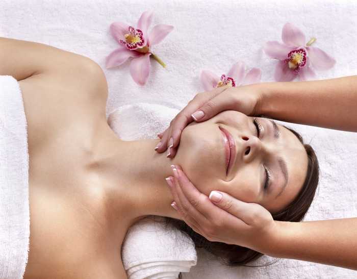 woman having face massage