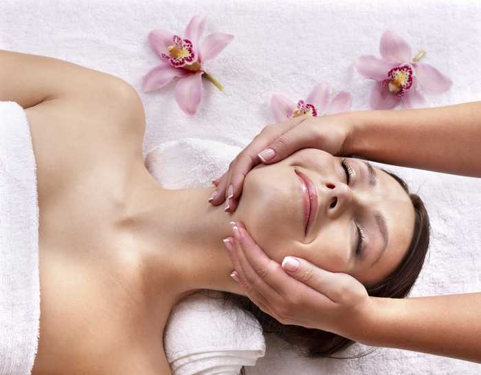 woman having face massage woman having face massage
