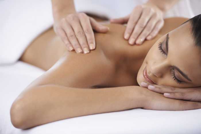 woman having a massage woman having a massage