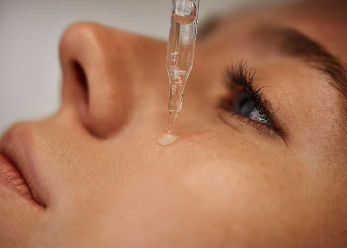 lady having serums applied to skin to help reduce the appearance of wrinkles