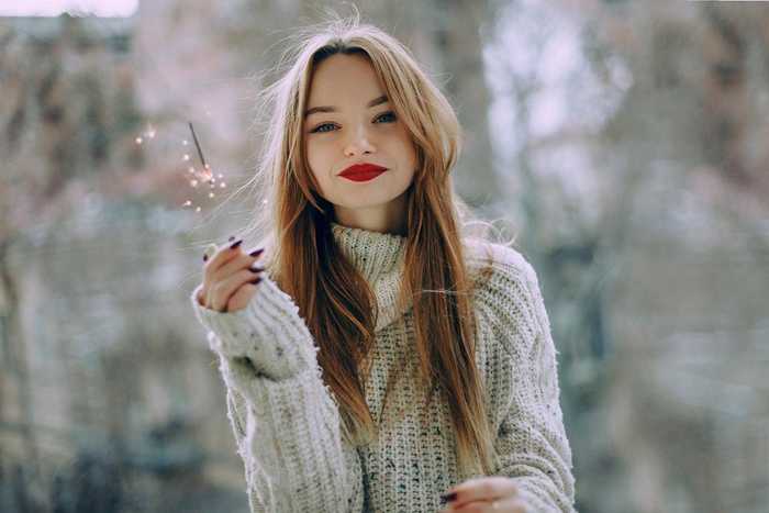 young woman with white jumper