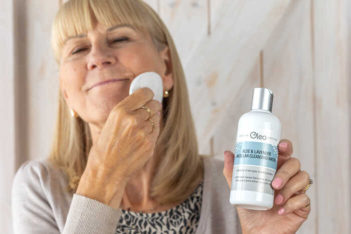 Olivia using Aloe & Lavender Micellar Cleansing Water to clean her skin Olivia using Aloe & Lavender Micellar Cleansing Water to clean her skin