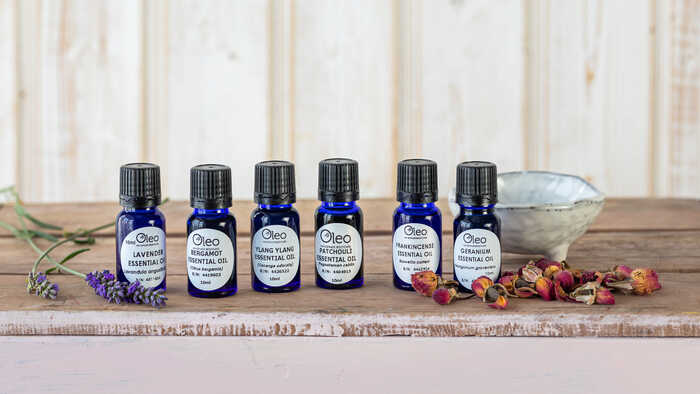 A selection of 10ml Oleo Bodycare essential oils in plastic bottles