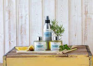Room Sprays & Reed Diffusers Oleo Bodycare Room Sprays and Reed Diffusers displayed on a trunk