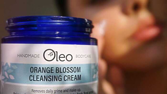 Lady applying Replenishing Facial Moisturiser